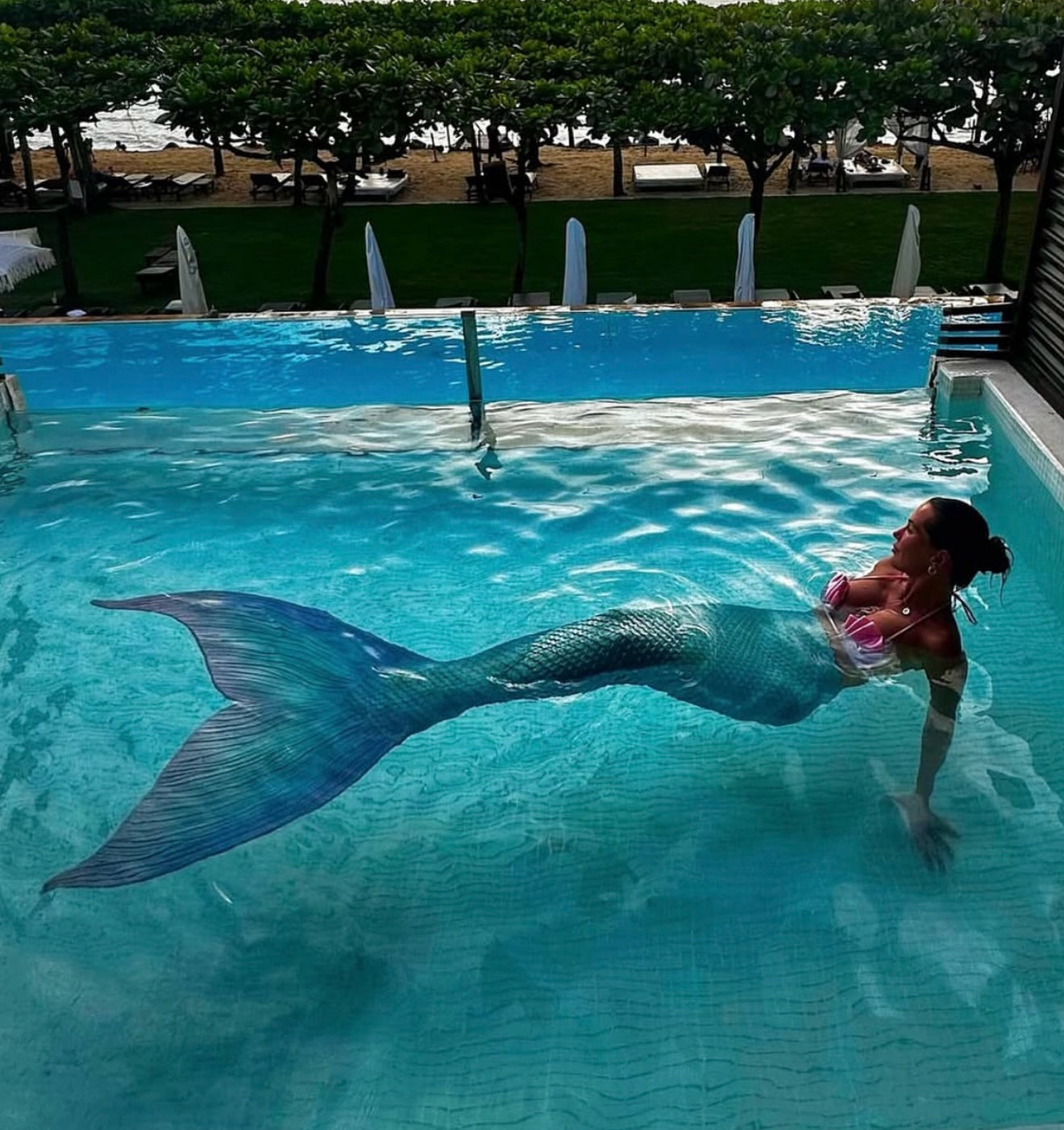 Mermaid in luxury pool